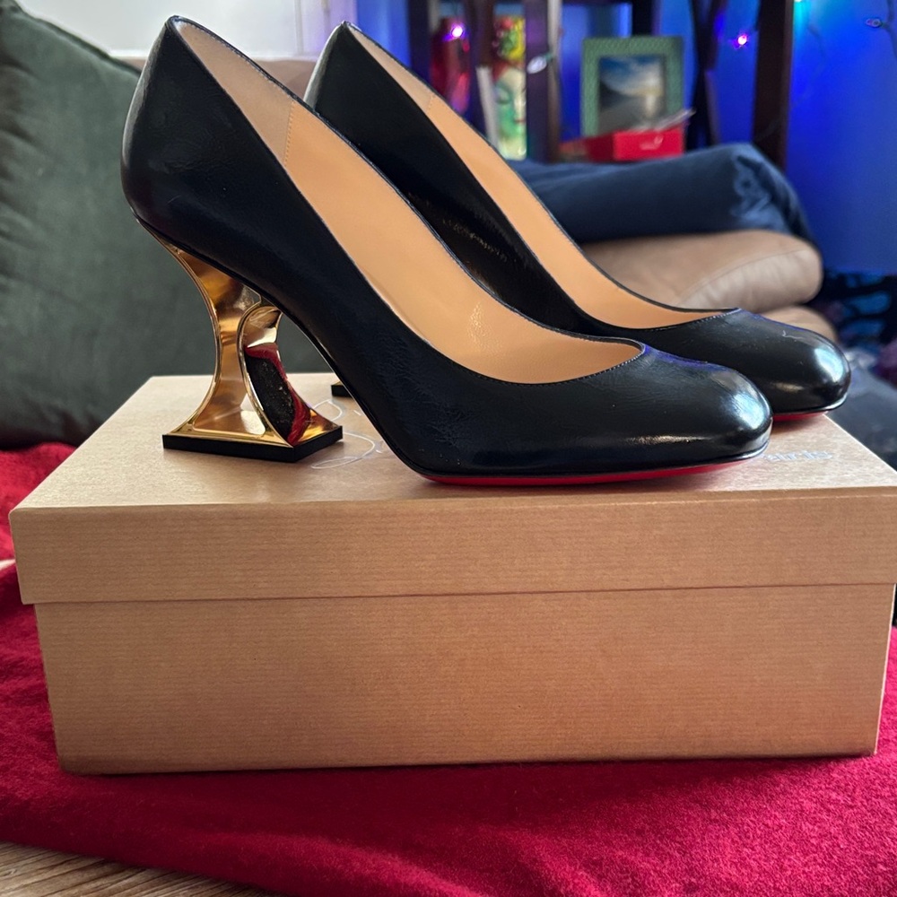 Christian Louboutin Black and Gold Heels